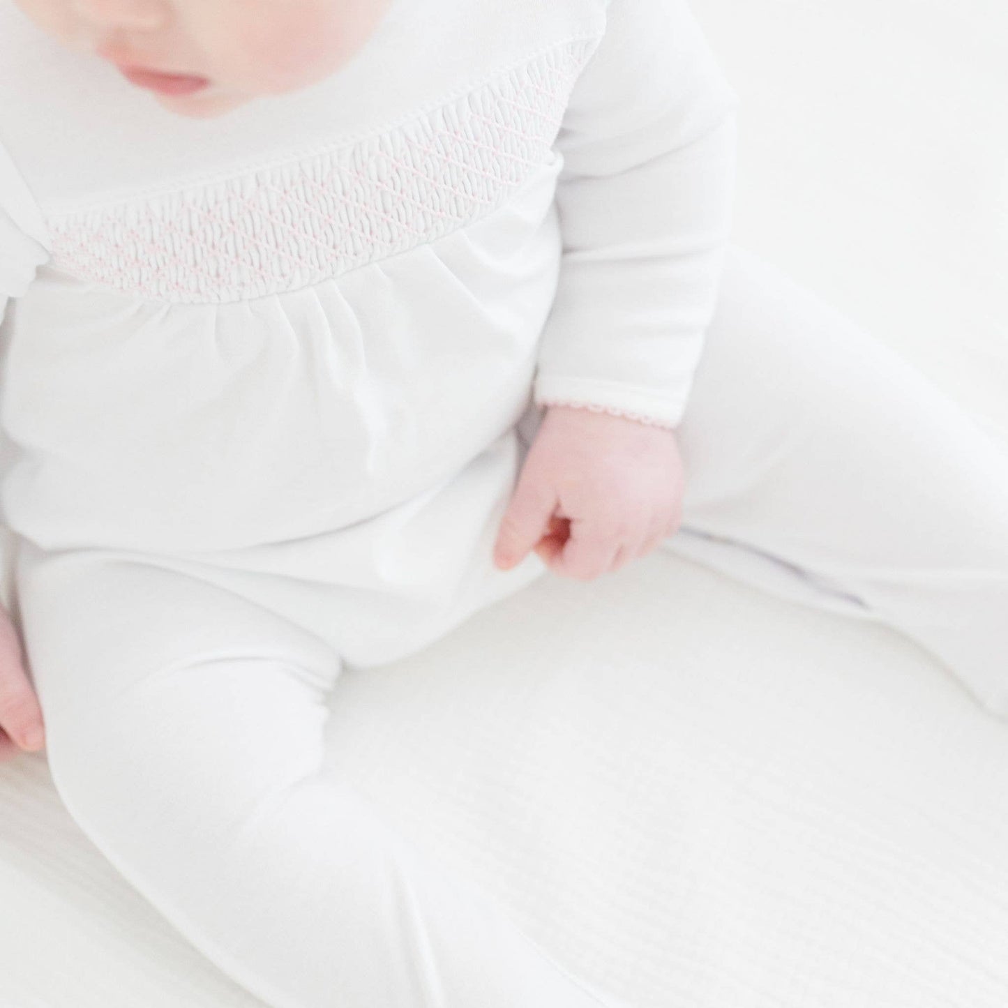 Magnolia Baby - Essentials White with Pink Trim Smocked Footie